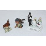 Two various Beswick figures of birds together with a ceramic fairing depicting a man and two young