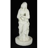 A Parian porcelain figure of the Madonna, raised on circular pedestal base. (AF) 31cm high.