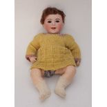 An SFBJ model 236 8 porcelain headed doll with sleeping eyes and five-piece bent-limb composition