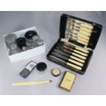 An Edwardian silver vesta case together with six silver-topped cut glass toilet jars, three ebony-