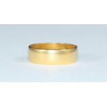 A 22ct gold wedding band, gross weight approximately 5.5g.