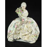 A 19th century Continental porcelain figure of a seated lady, possibly Russian, modelled in 18th