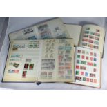 A collection of assorted used GB and world stamps across five albums, largely stamped and franked,