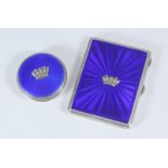 A silver and blue guilloche enamel cigarette case with applied silver Royal Navy crown, of