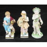 A pair of Meissen porcelain figures of a girl with a cat and a boy with a dog (as found), approx.