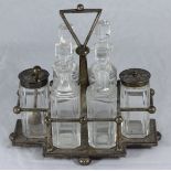 A silver-plated Hukin & Heath cruet set, possibly after Christopher Dresser, stamped to underside,
