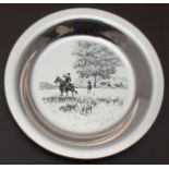 A limited edition silver plate by Franklin Mint, decorated with an etching entitled 'Riding to the