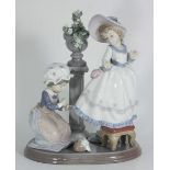 A boxed Lladro porcelain figure 'A Stitch in Time' no.5344, 19cm long.