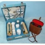 A Brexton picnic hamper containing place settings for four, two thermos flasks etc. together with