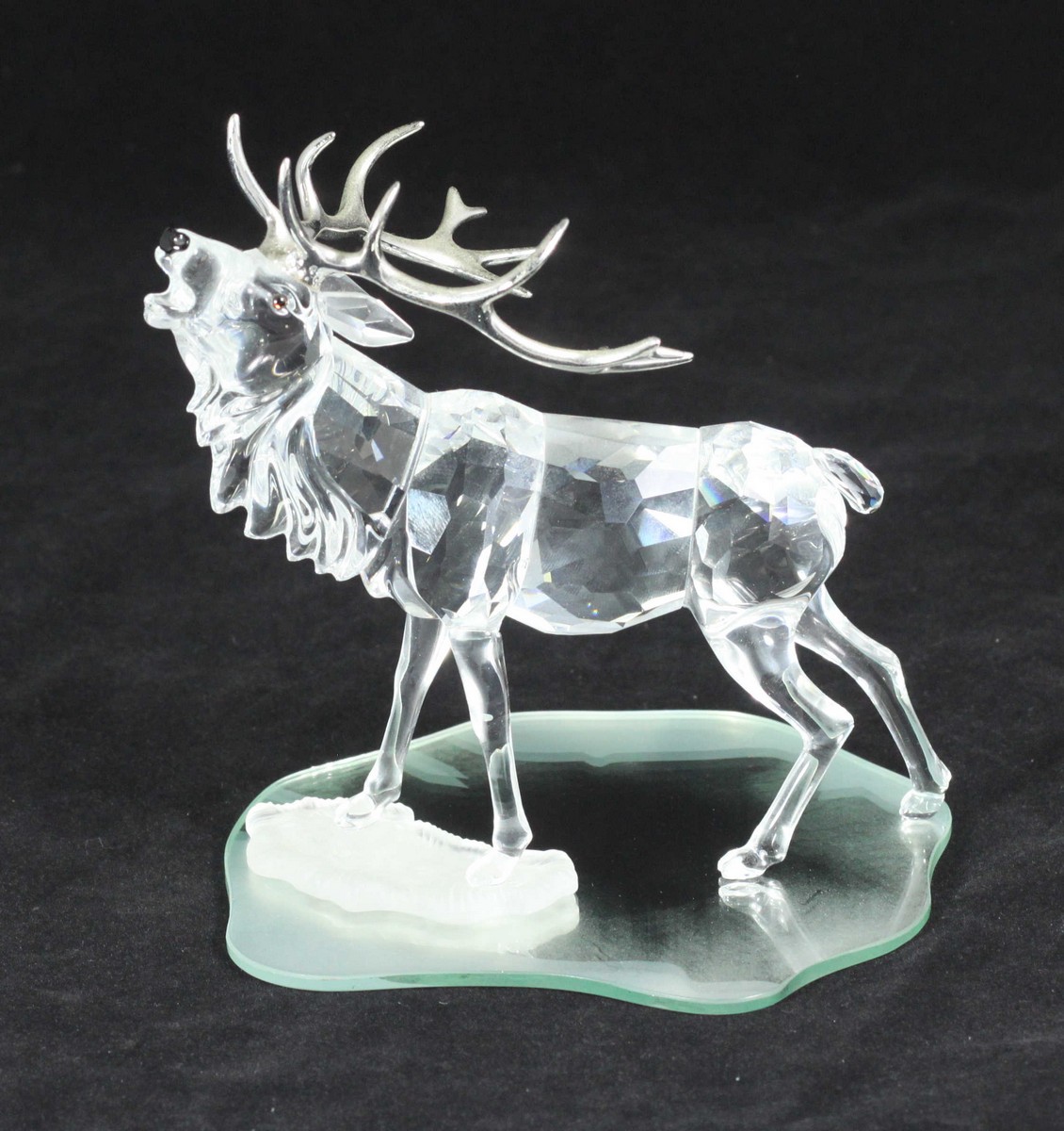 A Swarovski crystal model of a stag with silvered antlers, No. 291431, approx. 13cm high - Image 2 of 2