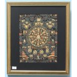 A Nepalese Tanka, decorated with spiritual figures, mounted, glazed and framed. 34 x 26cm.