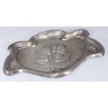 An Art Nouveau style Edwardian silver dressing table tray embossed with Reynolds's angels,