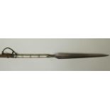 A North African fighting spear, with 46cm hand-forged double-fullered blade of elongated leaf