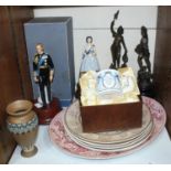 SECTION 27. A pair of Royal Doulton figures of Queen Elizabeth II and Prince Phillip on stands,