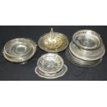 A quantity of silver-plated and metalware circular trays and serving baskets