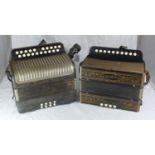 A Hohner 'Double-Ray' accordion and a Hohner single octave accordion, both with leather straps