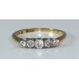 An 18ct gold five-stone diamond ring, estimated total diamond weight 0.40 carats, 2.5 grams