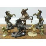 A pair of patinated spelter figures of the Marly Horses, together with three various single Marly