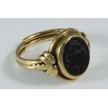 An unmarked yellow metal bloodstone seal ring (probably 18ct) 5.5 grams gross (shank has been cut)