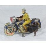 A lithographed tinplate clockwork motorcycle and rider, with tyres printed 'Union Cord', badge on