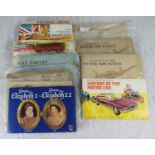 A small collection of assorted cigarette and tea cards of varying subjects including motor cars,