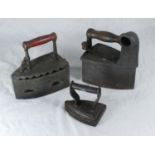 Three assorted antique clothes irons