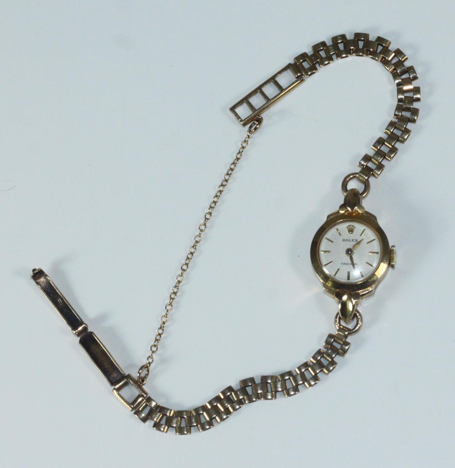 A ladies 9ct gold Rolex cocktail watch with later gold bracelet