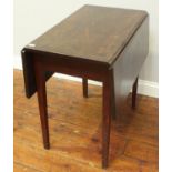 A mahogany Pembroke table, raised on squared, tapering supports, 76cm long