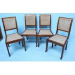 A set of four mahogany standard chairs, each with cane backs and seats, raised on squared tapering