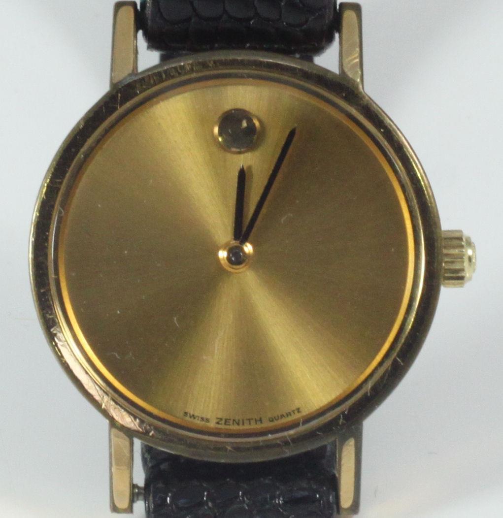 A ladies Zenith Quartz wristwatch, with gold-plated circular case and brushed gold dial with