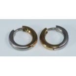 A pair of Platinum, diamond and 18ct yellow gold hoop earrings by Andre Bogaert, each set with a