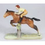 A Beswick pottery figure of 'Girl on Jumping Horse', No. 939, approx. 25cm high, one ear as found
