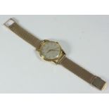 A late 1950s vintage gentlemen's IWC (International Watch Co) dress watch, 18ct gold plain