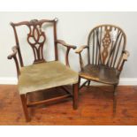 An 18th century mahogany carver chair in the Chippendale style with shell capped crest rail,