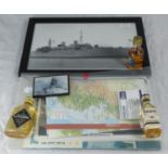 Ten various model ships maps and a monochrome print of a battleship and three miniature bottled