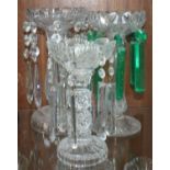 Three various cut-glass lustre vases including one with green prism drops