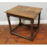 An 18th century oak side table with turned Doric supports and stretcher, 70cm