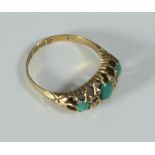 An 18ct gold, turquoise and diamond ring, claw-set carved head, cabochon cut turquoise, rose-cut