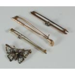 Four various brooches including gold and diamond butterfly brooch, golf club and a 15ct, platinum