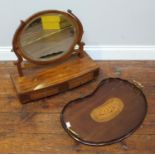 An Edwardian mahogany kidney-shaped serving tray with brass handles and inlaid Conche shell,