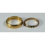 A 22ct gold wedding band, 7.7 grams, ring size T, together with a 9ct gold wedding ring, 1.5