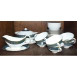 SECTION 45 A Royal Doulton six piece bone china dinner service, 'Carlyle' pattern, cream and green