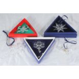 Four Swarovski crystal Christmas tree snowflake decorations Nos. 1992, 1994, 2004 & 2009 (one