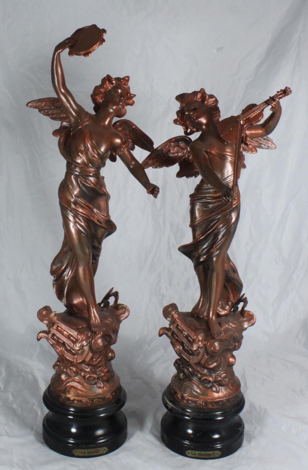 A pair of 19th century spelter figures emblematic of music & dance, on socle bases, later painted,