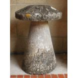 A large carved two-piece 'staddle stone' 72cm high