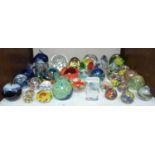 SECTION 9. A collection of glass paperweights including Mdina and IOW