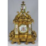 A 19th century French Ormolu mantel clock in the baroque style, with 8-day movement striking a