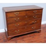 A 19th century mahogany chest of two short over three long, graduated drawers with original brass