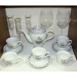 SECTION 31. A Hendrick's part tea service comprising teapot, six saucers and five cups titled 'A