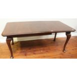 A Victorian mahogany dining table with cabriole legs, comes with extra leaf and winder, 122cm wide